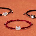 Buddha Stones Faceless Cat Head Red String Shell Connection Bracelet - Black Cat Black String - image 1