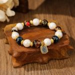 Buddha Stones Tibetan Zakiram Goddess of Wealth Charm Liuli Glass Incense Ash Porcelain Bead Protection Bracelet Bracelet BS White Porcelain Multicolored Liuli Glass Bead