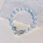 Buddha Stones Cat's Eye Crystal Peach Blossom Bell Fu Character Charm Support Bracelet 2