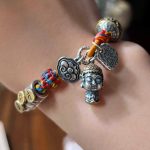 Buddha Stones Handmade Tibetan 925 Sterling Silver Chinese Zodiac Natal Buddha Zakiram Goddess of Wealth Protection Multicolored Rope Braided Bracelet Bracelet BS 20