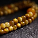 Buddha Stones 108 Mala Beads Natural Tiger Eye Copper Dorje Protection Tassel Bracelet Mala Bracelet BS 2