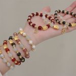 Buddha Stones Year Of The Dragon Red Agate Strawberry Quartz Black Obsidian Jade Garnet Pearl Cinnabar Dumpling Dragon Luck Fu Character Bracelet Bracelet BS 38
