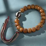 Buddha Stones Natural Tibetan Camel Bone Swastika Dzi Bead Shankha Buddha Charm Kirtimukha Luck Protection Tassel Bracelet Bracelet BS Camel Bone&Black White Bead(Wrist Circumference 15-16cm)