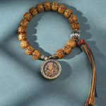 Buddha Stones Natural Tibetan Camel Bone Swastika Dzi Bead Shankha Buddha Charm Kirtimukha Luck Protection Tassel Bracelet Bracelet BS 7