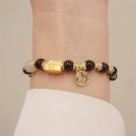 Buddha Stones Year Of The Dragon Red Agate Strawberry Quartz Black Obsidian Jade Garnet Pearl Cinnabar Dumpling Dragon Luck Fu Character Bracelet Bracelet BS 16