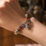 Buddha Stones Handmade Tibetan 925 Sterling Silver Chinese Zodiac Natal Buddha Zakiram Goddess of Wealth Protection Multicolored Rope Braided Bracelet Bracelet BS 19