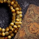 Buddha Stones 108 Mala Beads Natural Tiger Eye Copper Dorje Protection Tassel Bracelet Mala Bracelet BS 21