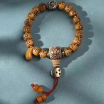 Buddha Stones Natural Tibetan Camel Bone Swastika Dzi Bead Shankha Buddha Charm Kirtimukha Luck Protection Tassel Bracelet Bracelet BS 13
