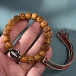 Buddha Stones Natural Tibetan Camel Bone Swastika Dzi Bead Shankha Buddha Charm Kirtimukha Luck Protection Tassel Bracelet Bracelet BS 11