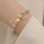 Buddha Stones Year Of The Dragon Red Agate Strawberry Quartz Black Obsidian Jade Garnet Pearl Cinnabar Dumpling Dragon Luck Fu Character Bracelet Bracelet BS 21