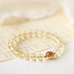 Buddha Stones Golden Rutilated Quartz Strawberry Quartz Star Protection Bracelet