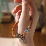 Buddha Stones Handmade Tibetan 925 Sterling Silver Chinese Zodiac Natal Buddha Zakiram Goddess of Wealth Protection Multicolored Rope Braided Bracelet Bracelet BS 2