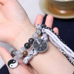 Buddha Stones Black Glitter Stone Cat's Eye Yin Yang Mountain Ghosts Spend Money Power Double Layer Rope Bracelet Bracelet BS 5