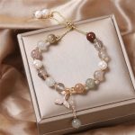 Buddha Stones Strawberry Quartz Rutilated Quartz Fishtail Charm Healing Bracelet Bracelet BS 8