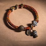 Buddha Stones Handmade Tibetan 925 Sterling Silver Chinese Zodiac Natal Buddha Zakiram Goddess of Wealth Protection Multicolored Rope Braided Bracelet Bracelet BS main