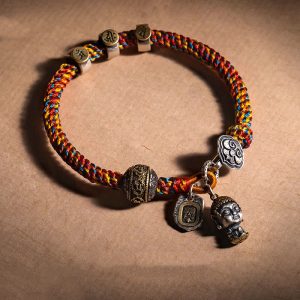 Buddha Stones Handmade Tibetan 925 Sterling Silver Chinese Zodiac Natal Buddha Zakiram Goddess of Wealth Protection Multicolored Rope Braided Bracelet Bracelet BS main