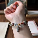 Buddha Stones Handmade Tibetan 925 Sterling Silver Chinese Zodiac Natal Buddha Zakiram Goddess of Wealth Protection Multicolored Rope Braided Bracelet Bracelet BS 23