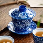 Buddha Stones Plum Blossom Blue And White Porcelain Ceramic Gaiwan Sancai Teacup Kung Fu Tea Cup And Saucer With Lid 185ml Cup BS 2