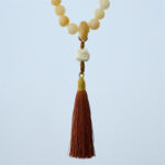 Buddha Stones Natural Bodhi Seed Ivory Fruit Dancing Lion Charm Harmony Tassel Wrist Mala Wrist Mala BS 5