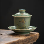 Buddha Stones Green Porcelain Butterfly Flower Salmon Fish Ceramic Gaiwan Sancai Teacup Kung Fu Tea Cup And Saucer With Lid Cup BS 2