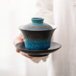 Buddha Stones Retro Blue Ocean Sea Waves Gradient Ceramic Gaiwan Sancai Teacup Kung Fu Tea Cup And Saucer With Lid Cup BS Blue Black Gradient 11.3*9.3cm*120ml