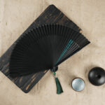 Buddha Stones Simple Cherry Flower Hollow Engraved Handheld Bamboo Folding Fan Folding Fan BS Black 22cm