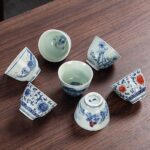 Buddha Stones Blue Landscape Mountains Lotus Cute Cat Pavilions Magnolia Reed Egrets Ceramic Teacup Small Kung Fu Tea Cup Cup BS main