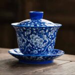 Buddha Stones Plum Blossom Blue And White Porcelain Ceramic Gaiwan Sancai Teacup Kung Fu Tea Cup And Saucer With Lid 185ml Cup BS 1