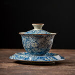 Buddha Stones Vintage Blue And White Porcelain Peach Blossom Lotus Peony Ceramic Gaiwan Sancai Teacup Kung Fu Tea Cup And Saucer With Lid Cup BS 10cm*11cm*160ml(Saucer 15.3cm)