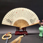 Buddha Stones A Panorama Of Rivers And Mountains Cranes Orchid Flower Paper Bamboo Handheld Silk Bamboo Folding Fan 22cm Folding Fan BS Heart Sutra 22cm