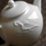 Buddha Stones White Plum Pine Bamboo Engraved Design Ceramic Teapot Teapot BS 8