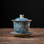 Buddha Stones Vintage Blue And White Porcelain Peach Blossom Lotus Peony Ceramic Gaiwan Sancai Teacup Kung Fu Tea Cup And Saucer With Lid Cup BS 9cm*9.7cm*150ml(Saucer 11cm)