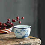 Buddha Stones Koi Fish Lotus Flower Leaf Mountains Tree Ceramic Teacup Kung Fu Tea Cup 130ml Cup BS Mountains House 7.7cm*5.1cm*130ml