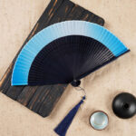 Buddha Stones Solid Color Gradient Hollow Engraved Handheld Bamboo Folding Fan Folding Fan BS Blue Gradient 21.5cm