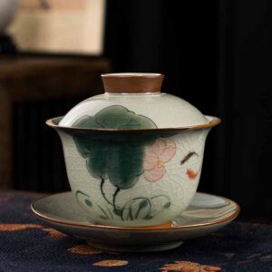 Buddha Stones Lotus Koi Fish Pod Leaf Ceramic Gaiwan Sancai Teacup Kung Fu Tea Cup And Saucer With Lid 140ml Cup BS Lotus Koi Fish 11.5cm*9.5cm*140ml