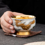 Buddha Stones Golden Eagle Auspicious Dragon Sun Ocean Waves Gilt Ceramic Teacup Kung Fu Tea Cup Cup BS 5